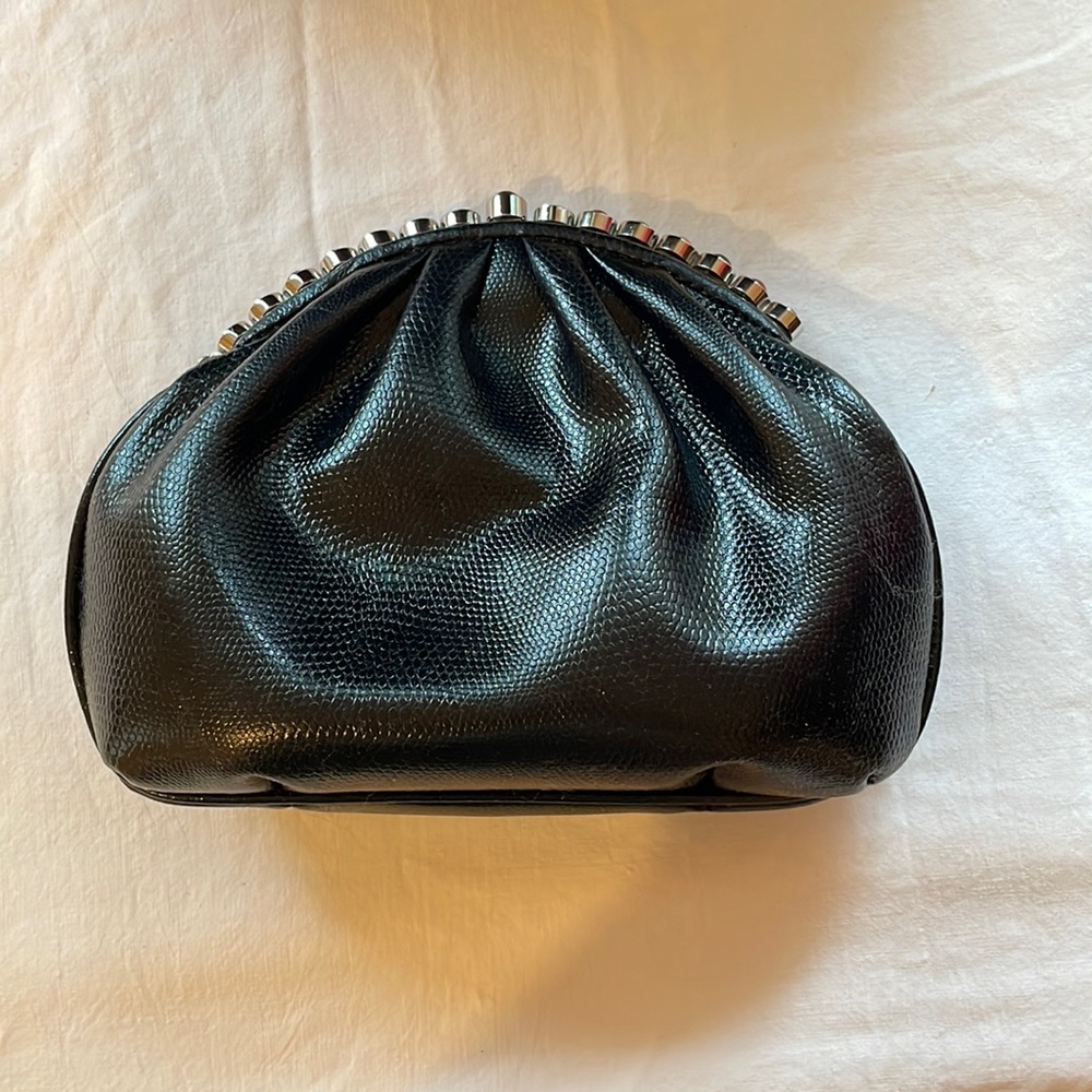 Small black evening bag with jewel detail